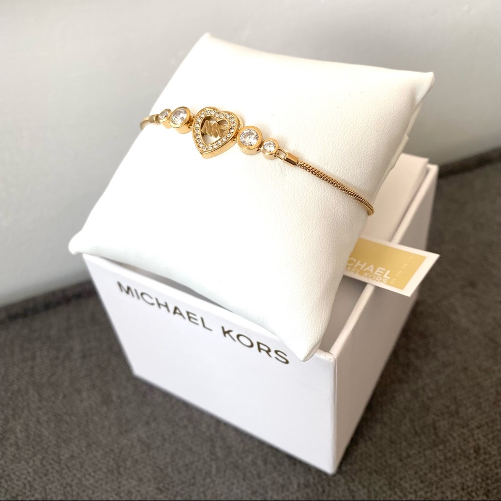 Authentic MK gold tone heart adjustable bracelet